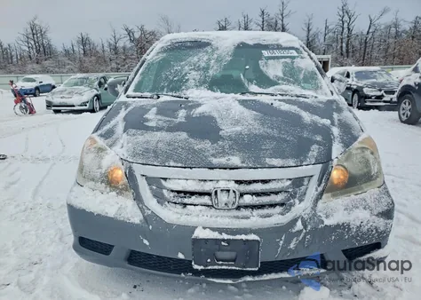 2010 Honda Odyssey Exl z USA, uszkodzony, nr VIN 5FNRL3H79AB023720